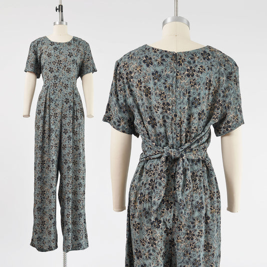 Vintage 90s floral print jumpsuit with wide legs.