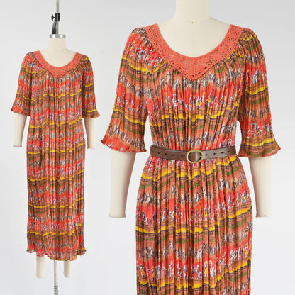 Vintage 90s boho orange broomstick pleated dress with crochet neckline.