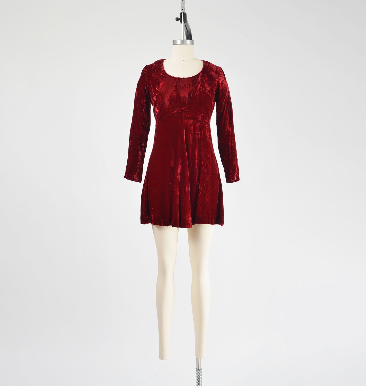 Full front view of 70s burgundy red velvet mini dress.