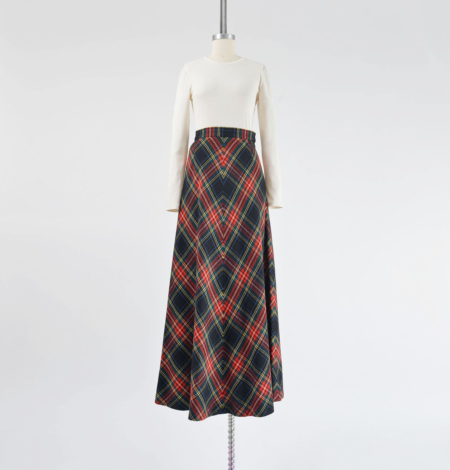 Full view vintage 70s tartan plaid wool flared maxi skirt.