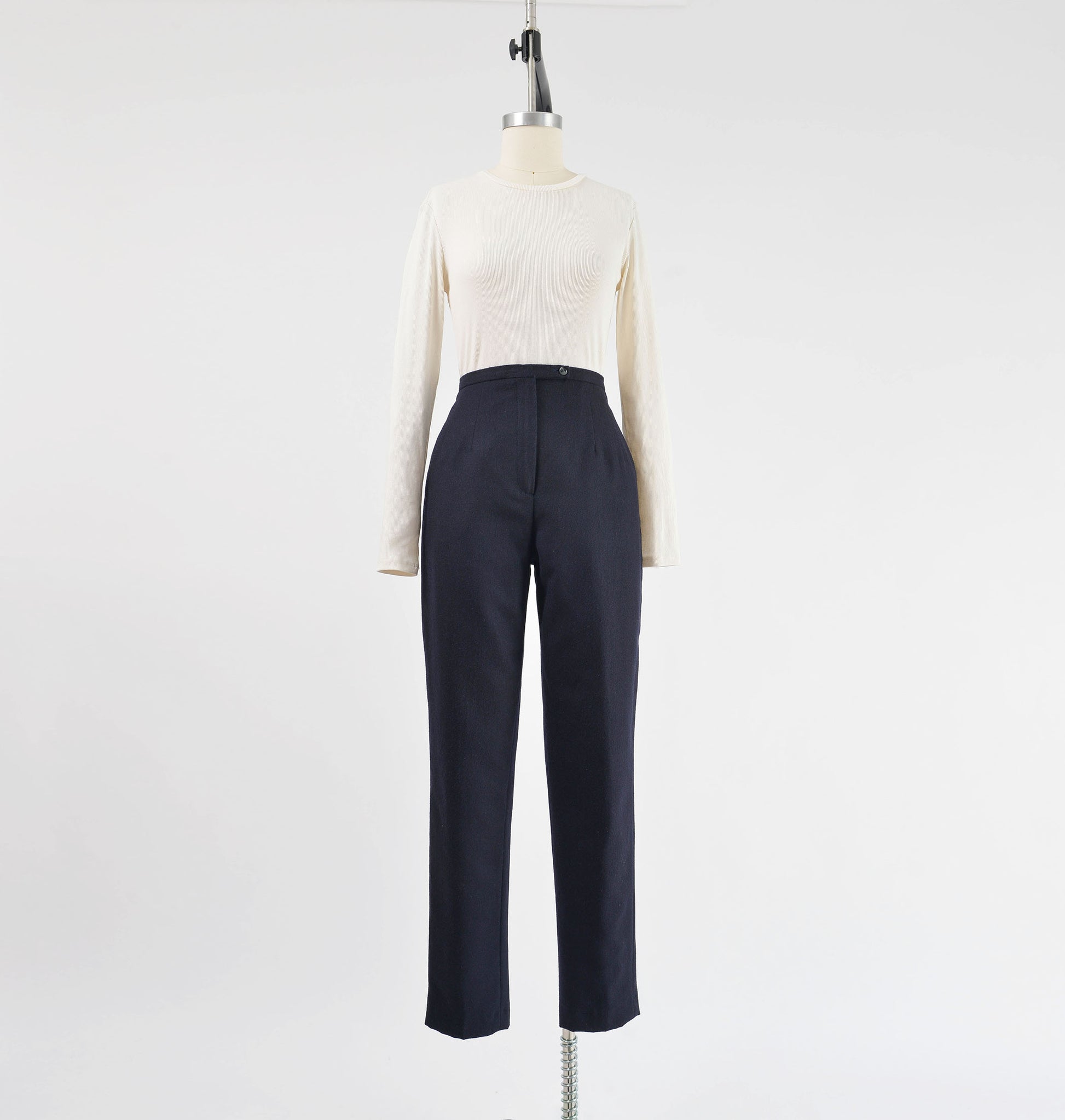 Full length 1990s navy wool blend high waisted trousers.