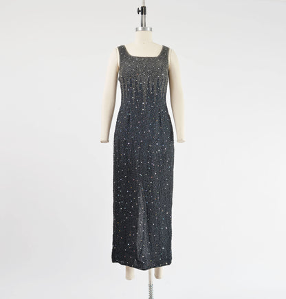 Full length view of vintage 90s black silk maxi dress with silver beading.