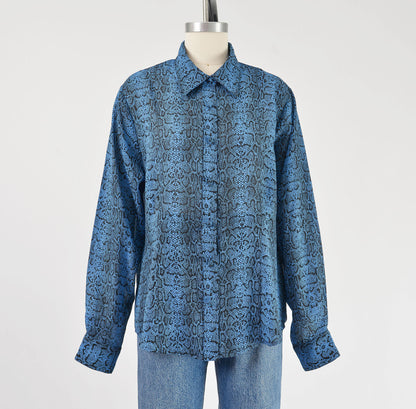 Full front view of vintage 90s blue snakeskin print blouse. Semi sheer fabric. Button down front.