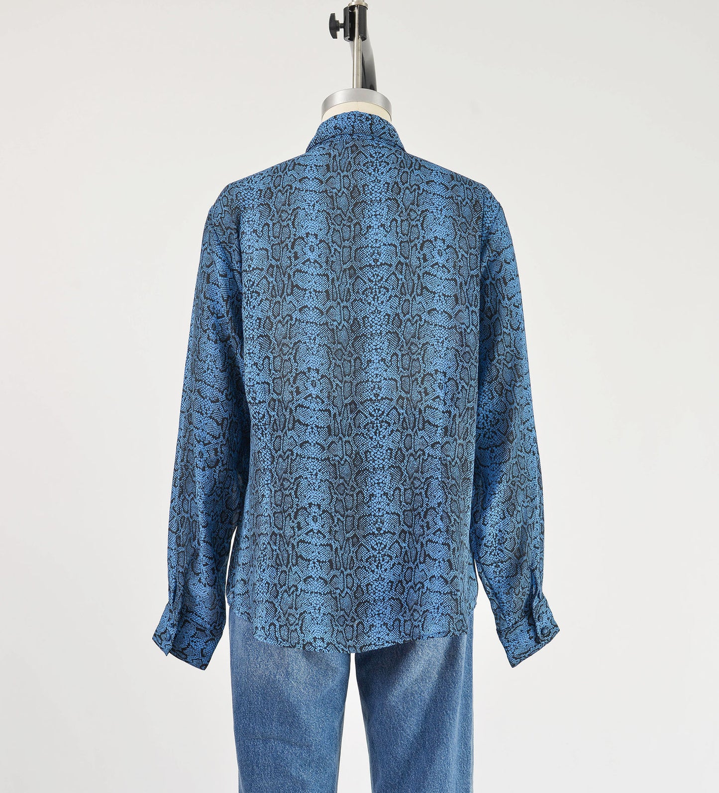 Back view of vintage 90s blue snakeskin print blouse. Semi sheer fabric. Button down front.