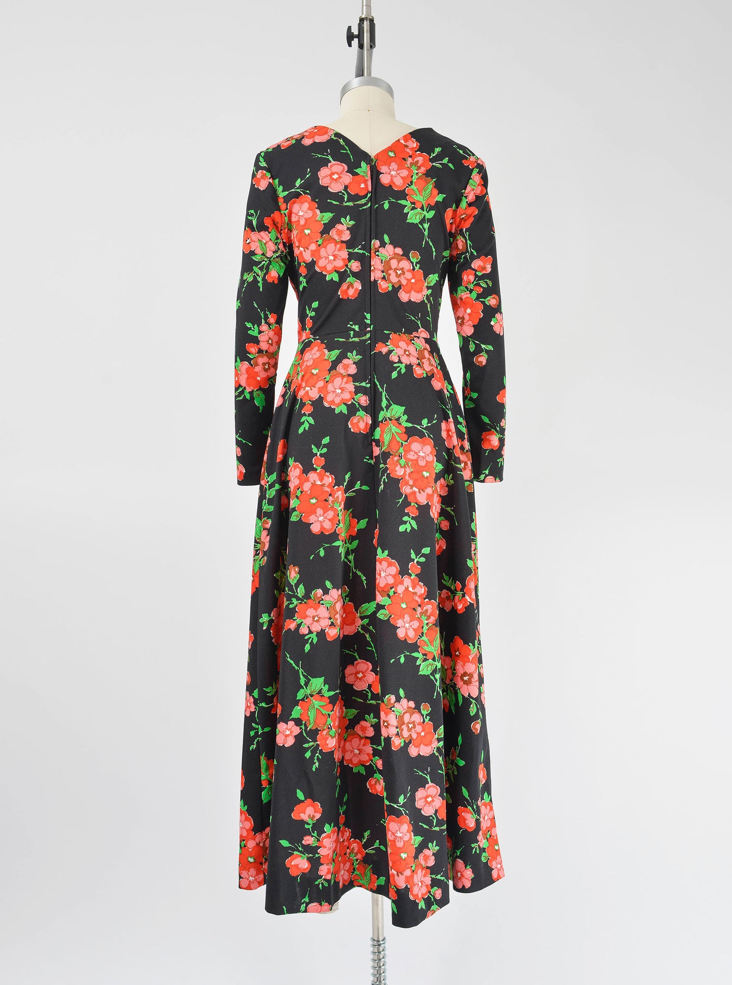 Full back view of 70s floral maxi dress.