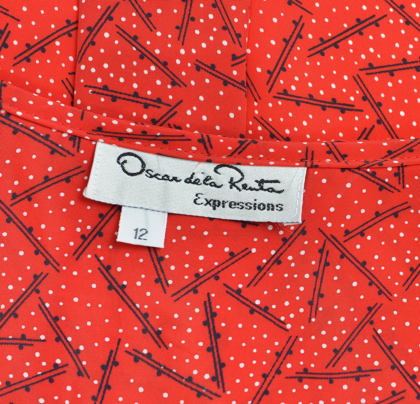 Oscar de la Renta Expressions label.