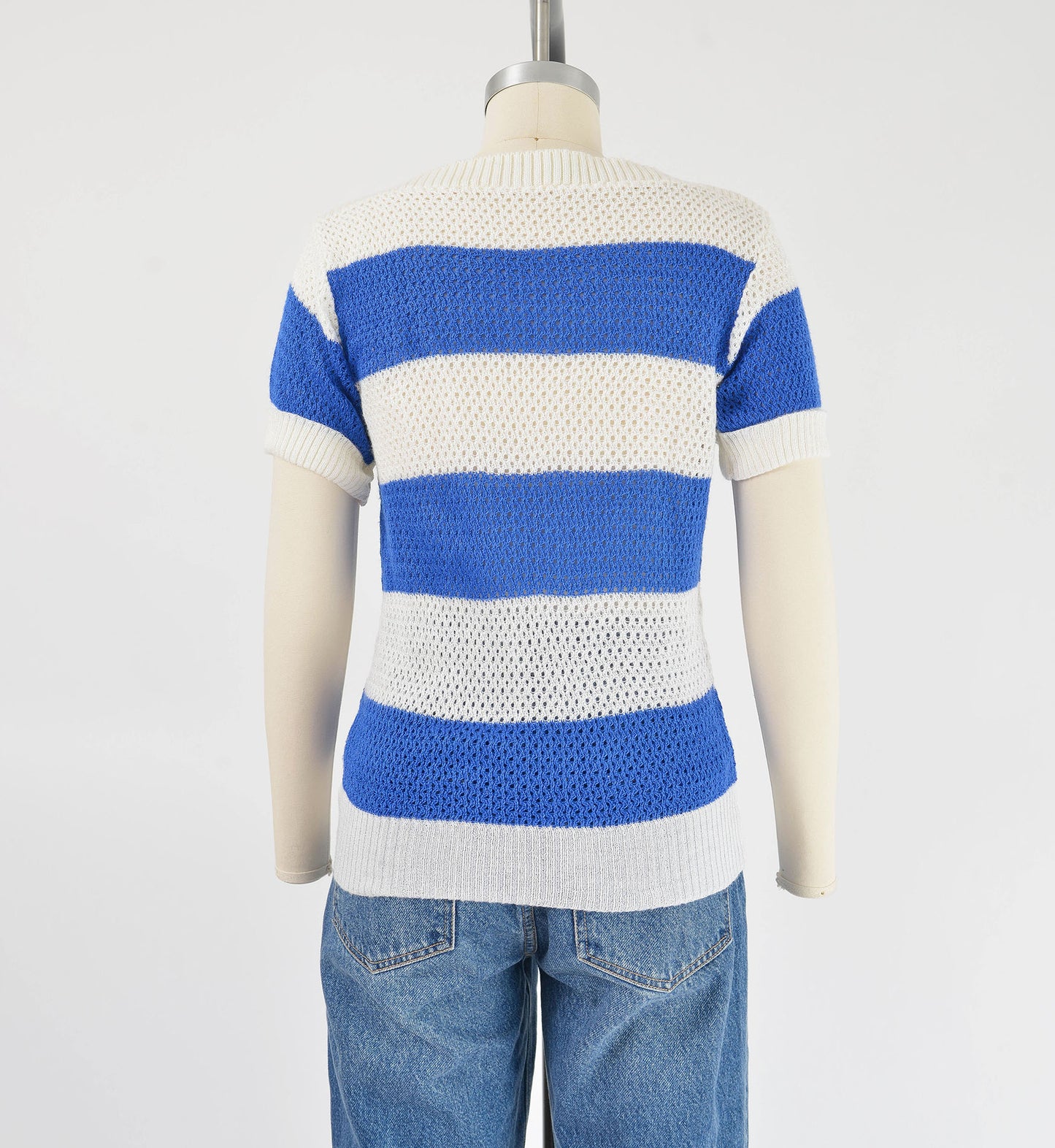 Full back view of 80s blue and white striped sweater.