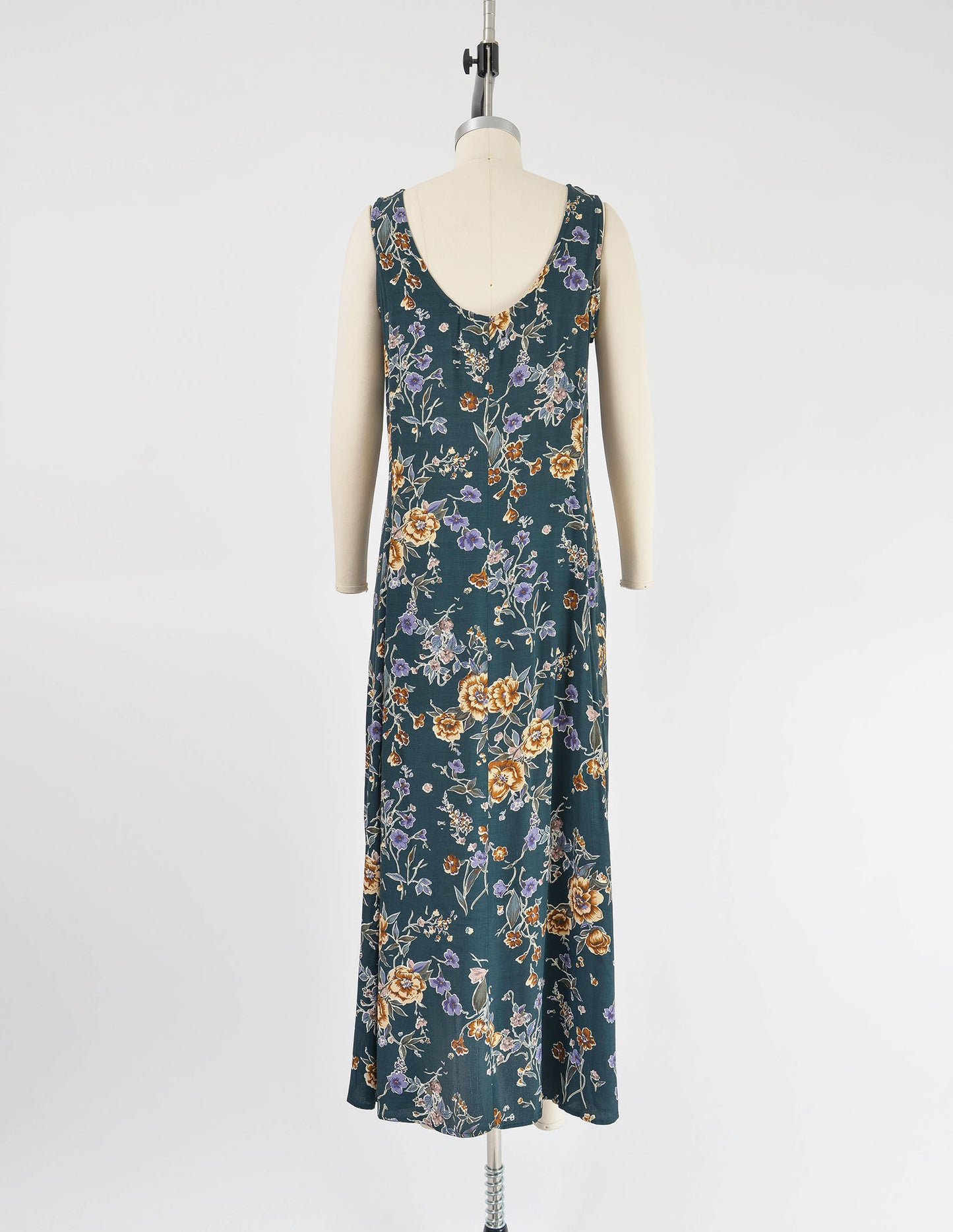 Full back view of vintage 90s green floral maxi dress.