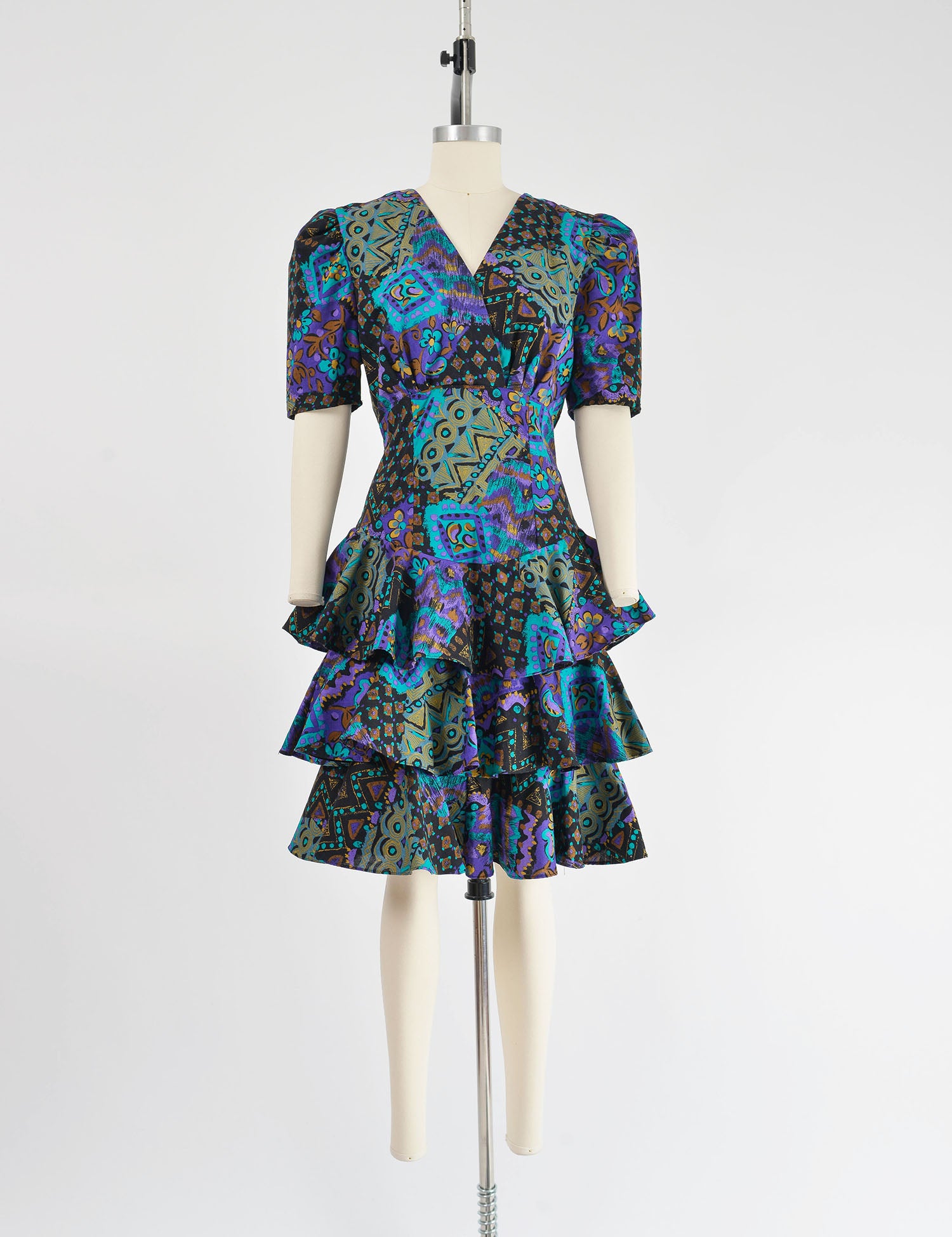 Full view of 80s abstract print cotton dress with tiered ruffle skirt.