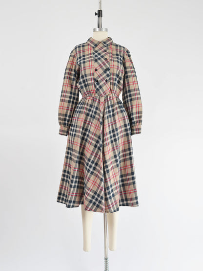 Vintage 1980s tan and black plaid cotton shirt dress. Collared neckline. Full skirt. Midi length.