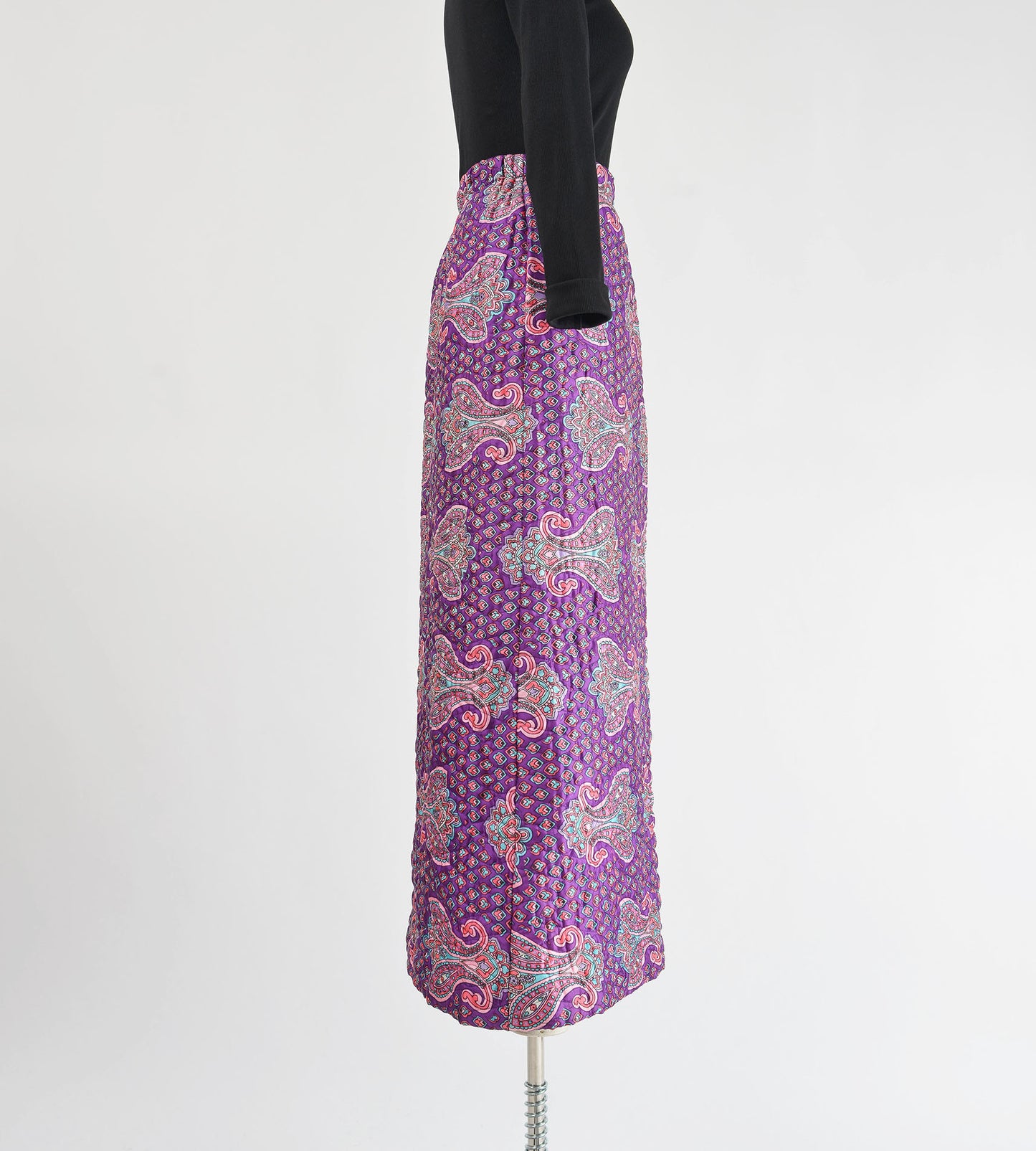 Side view vintage 70s purple paisley print quilted maxi skirt.