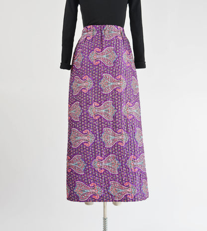 Back view of vintage 70s purple paisley print quilted maxi skirt.