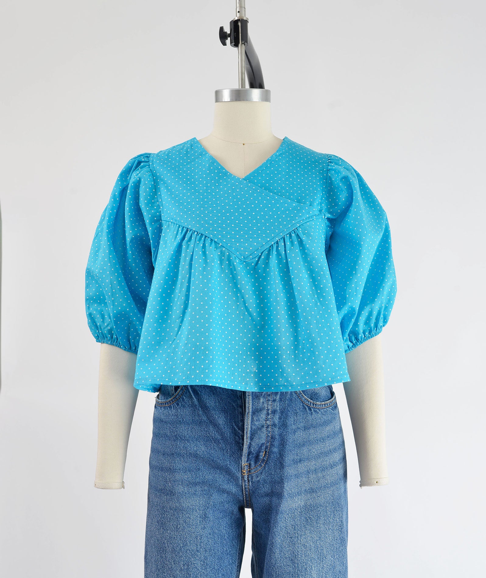 Vintage 80s blue polka dot puff sleeve cropped blouse.