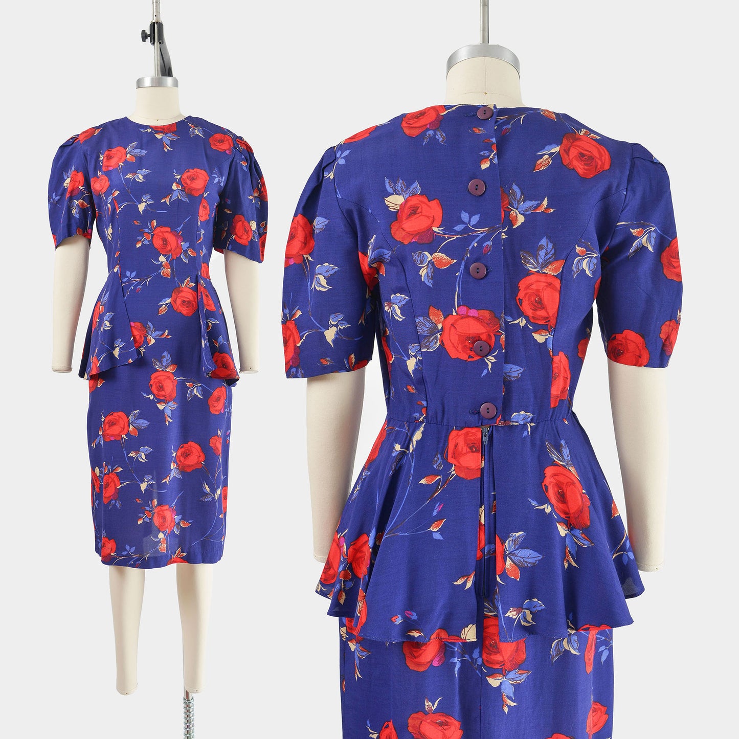 Vintage 80s purple and red floral print dress. Peplum waist with puff sleeves. Midi length.