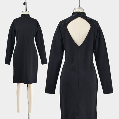 Vintage 90s Black wool blend sweater dress with beading at cut out back.